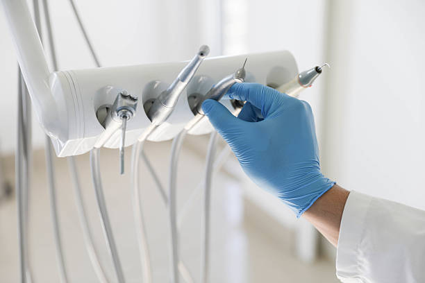 Professional Tooth Extraction technician working in Davidson County County, NC